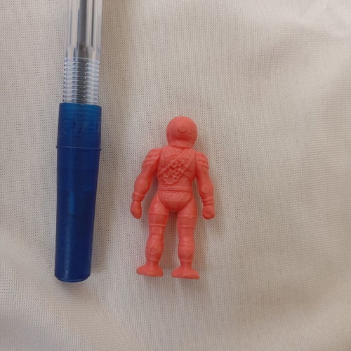 Alien figure collectible used, 4 cm, pink plastic