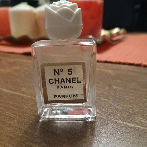 Mini bottle Chanel No. 5 used, vintage with white flower-shaped cap