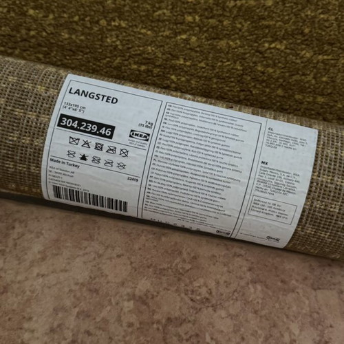 IKEA yellow medium rug