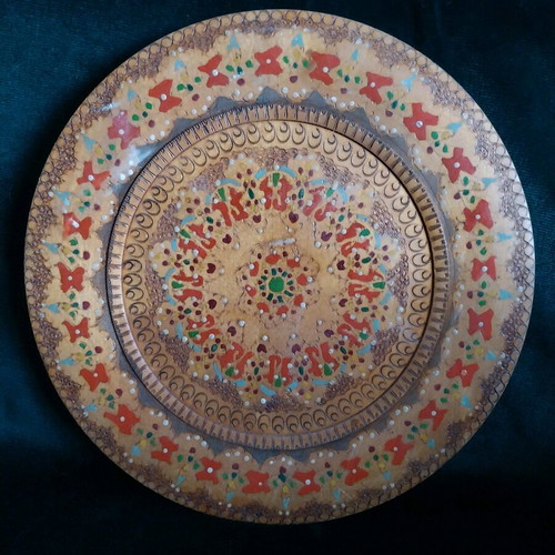 Wooden plate handmade used, carved decorative