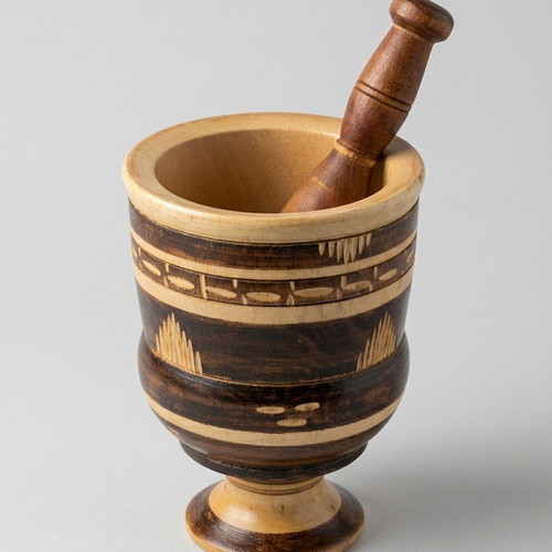 Wooden garlic grater used