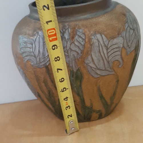 Indian brass vase used with embossed floral designs