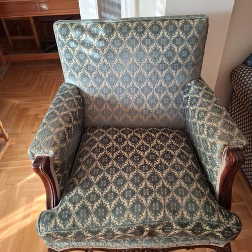 Vintage three-seater sofa and two antique armchairs with dark wood frame