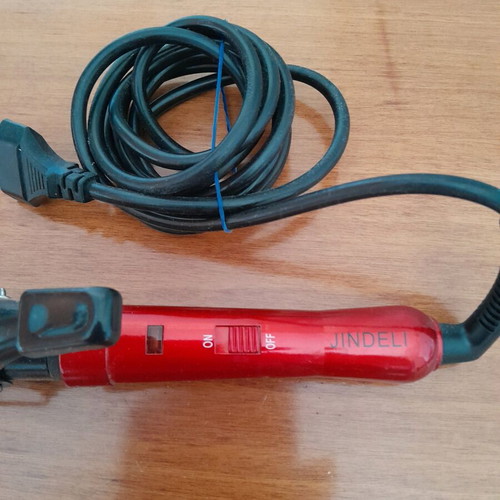 JINDELI hair curling iron like new