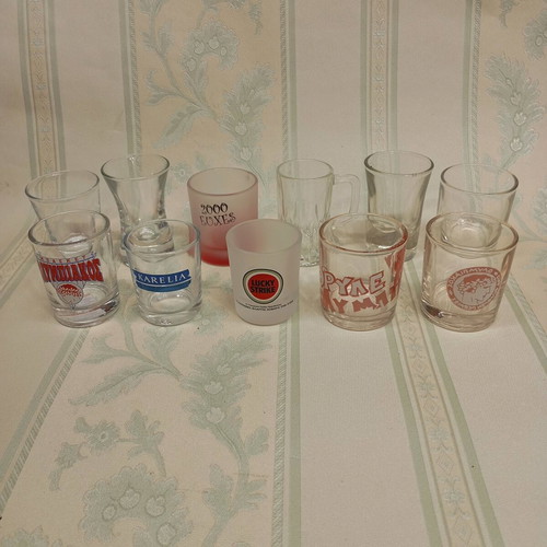 Collection of 87 shot glasses new, promotional and collectible