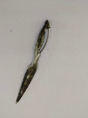 Vintage metal letter opener with unique handle