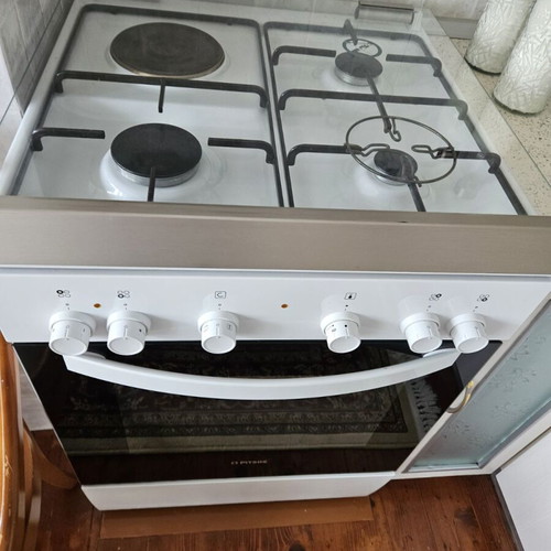 Gas stove with electric oven like new