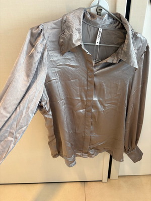 Silver shirt new, available in small and medium