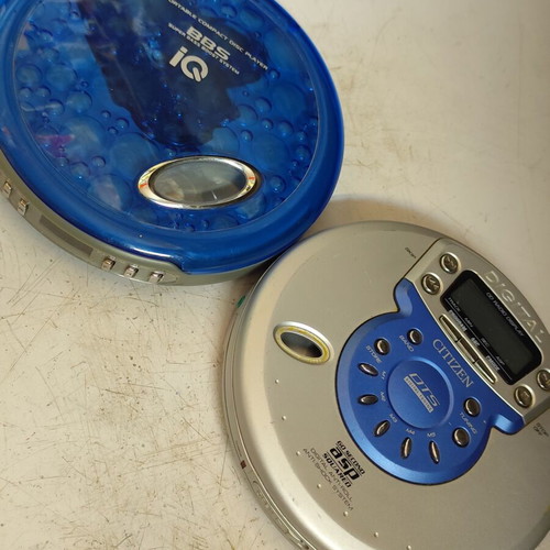 Vintage portable CD players Citizen PCD-2065EE and iQ BBS used for repair or parts