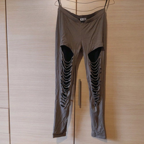 Be you khaki leggings used with black and rips S/M