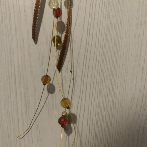 Hanging pomegranate charm new with gold and red ribbon