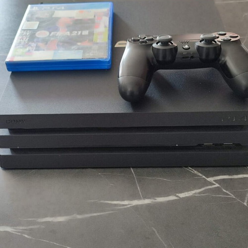 PlayStation 4 Pro 1TB console used with controller and FIFA 21 game