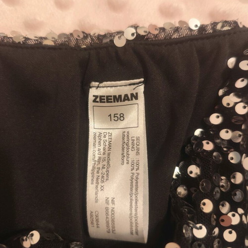 Girls' skirt size 158 cm new, black and silver with zipper