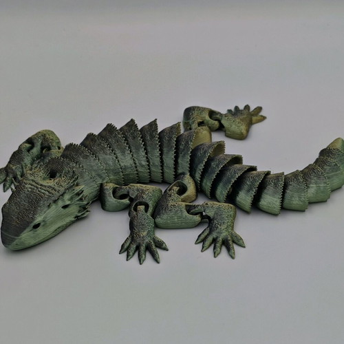 Articulated dragon new, 3d printed from esun pla silk magic material