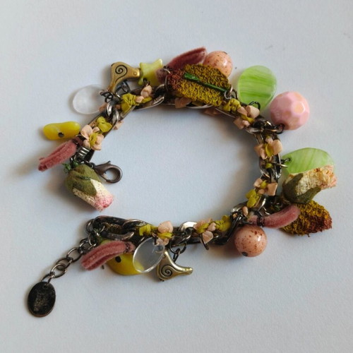 Handmade romantic bracelet like new with vintage charms