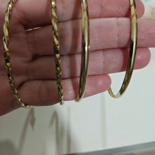 Hoop earrings used, 2 pairs gold tone