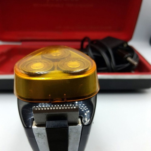 Vintage Norelco electric shaver with case used