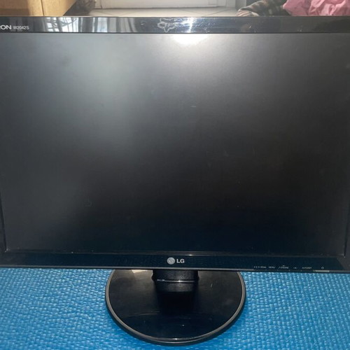 LG Monitor used with VGA and power cables, adjustable stand