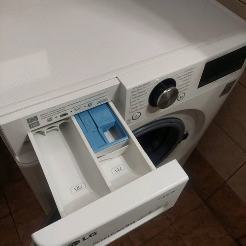 LG F4WV909P2 washing machine like new, 9 kg capacity