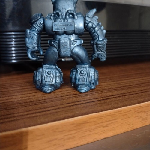 Teratomachos miniature figure used with cut on right hand