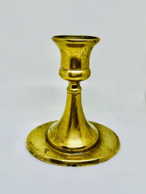 Vintage brass candlestick with patina used