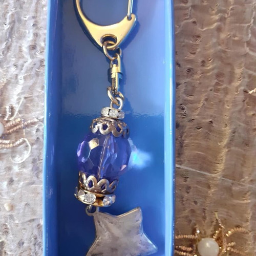 Keychain new with star charm and blue stone