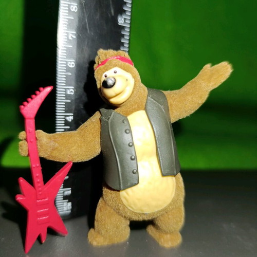 Masha and the Bear Bear figure used with electric guitar