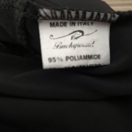 Viscose elastic Italian dress like new, black with points and transparencies