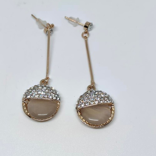 Earrings rose gold with cat eye and rhinestones like new