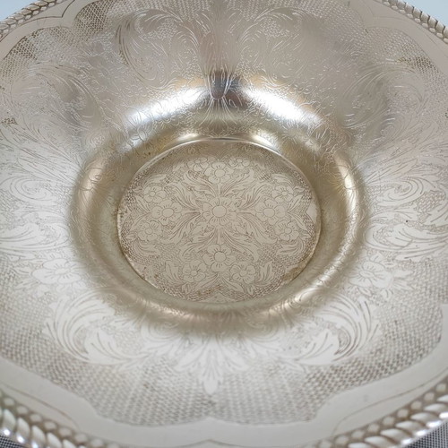 Decorative aluminum bowl used, silver with engraved design