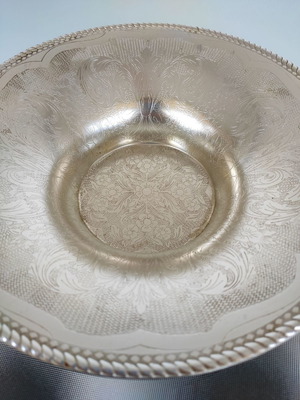 Decorative aluminum bowl used, silver with engraved design