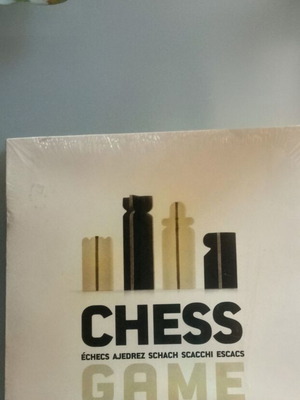 Chess game new, plastic laminated board for beginners