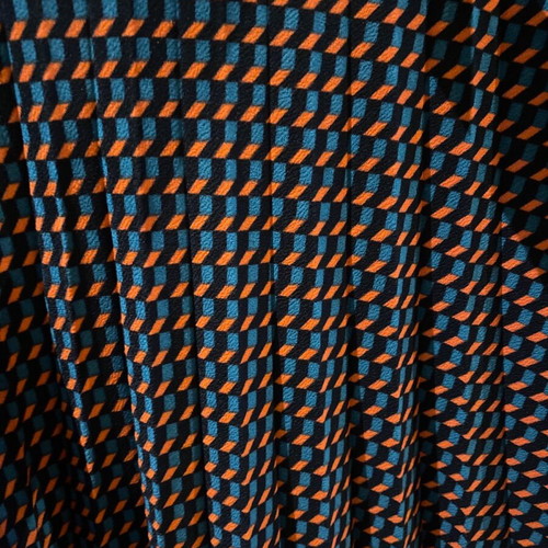 Pleated skirt with geometric pattern like new, black and blue