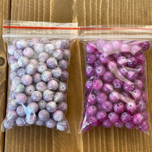Bead pack like new, lilac and fuchsia colors