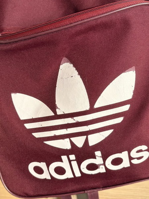 Adidas backpack used, burgundy with worn logo