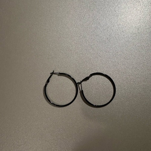 Black hoop earrings used, medium size
