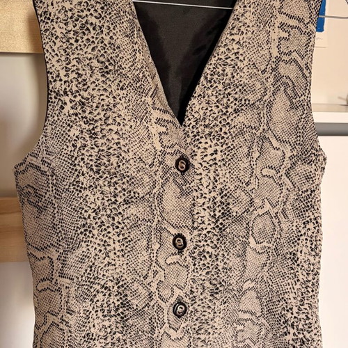 Burton sleeveless vest like new, black and beige, size M
