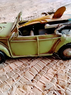 Decorative scarab used, metal with paint wear