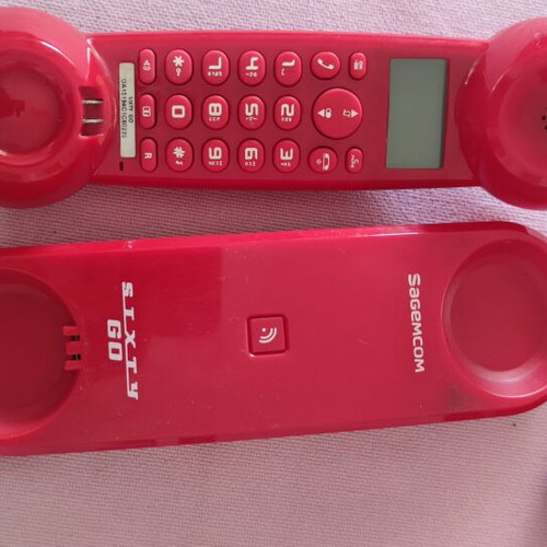 Sagemcom cordless phone used, red