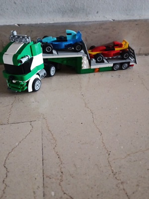 Lego truck with two formula cars used without box and instructions