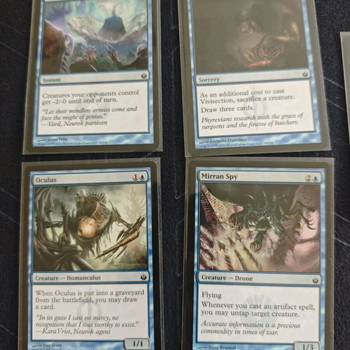 MTG Mirrodin Besieged 40 Cards Like New with Sleeves