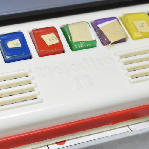 Melodica 12 children's keyboard used with case, vintage