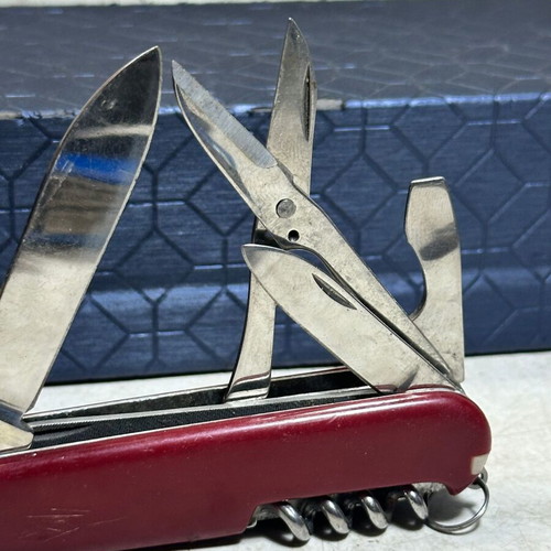 Vintage Swiss Army Pocket Multitool with Scissors and Corkscrew used