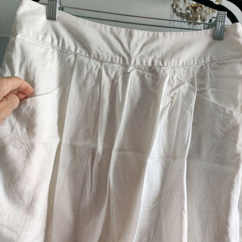 Lacoste white skirt like new with pleats and zipper