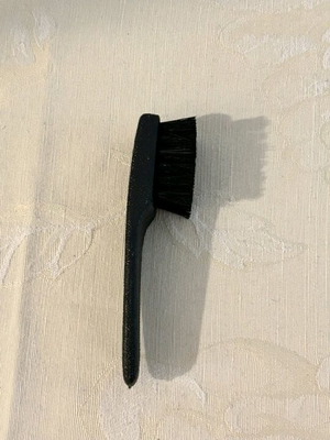 Vintage shoe care brush used