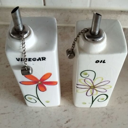 Oil and vinegar set new with decorative designs