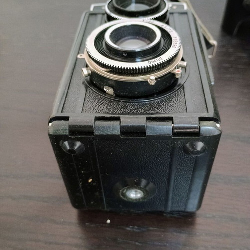 Lubitel 2 camera used with black leather case