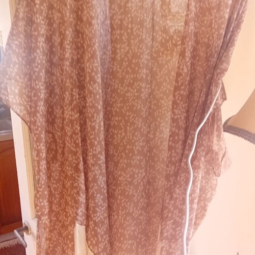 Kimono with soft color and fringes