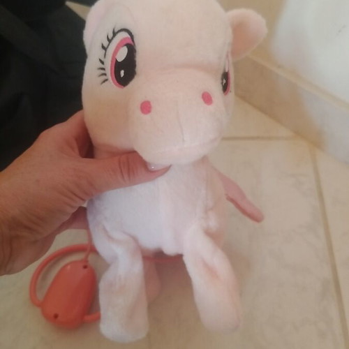 Mechanical unicorn like new, functional walking toy
