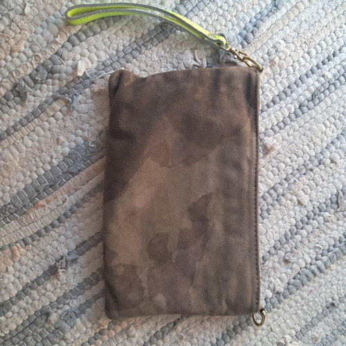 Leather wristlet bag with fluorescent details, Italy